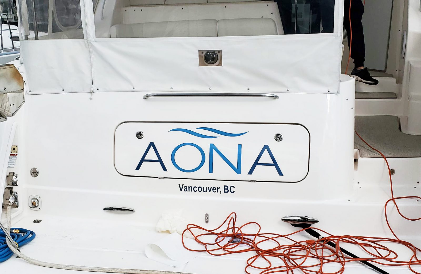AONA boat installed logo decal on the deck