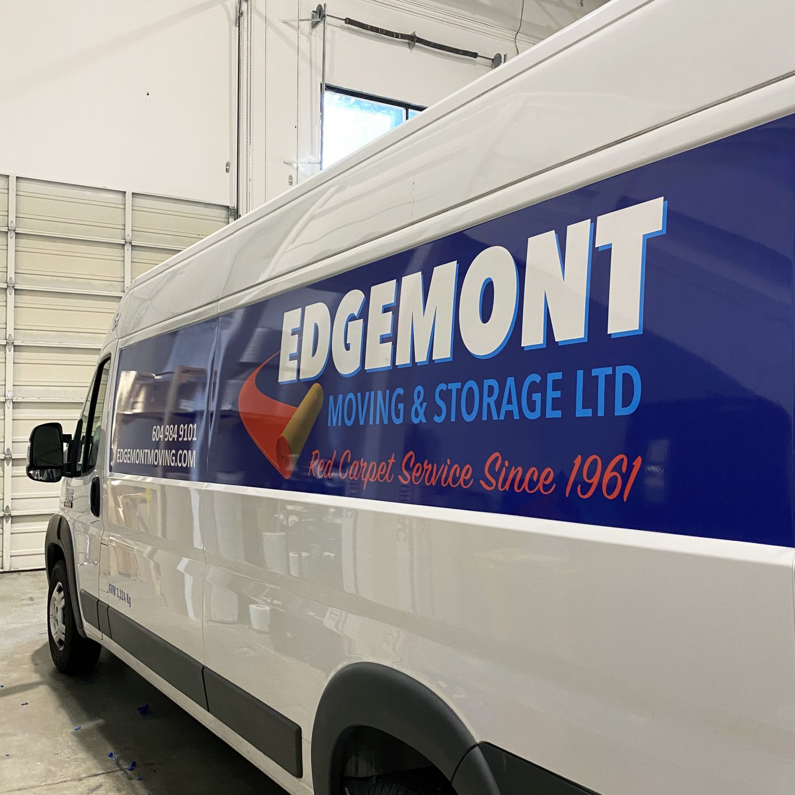side view of Edgemont Moving Car wraps