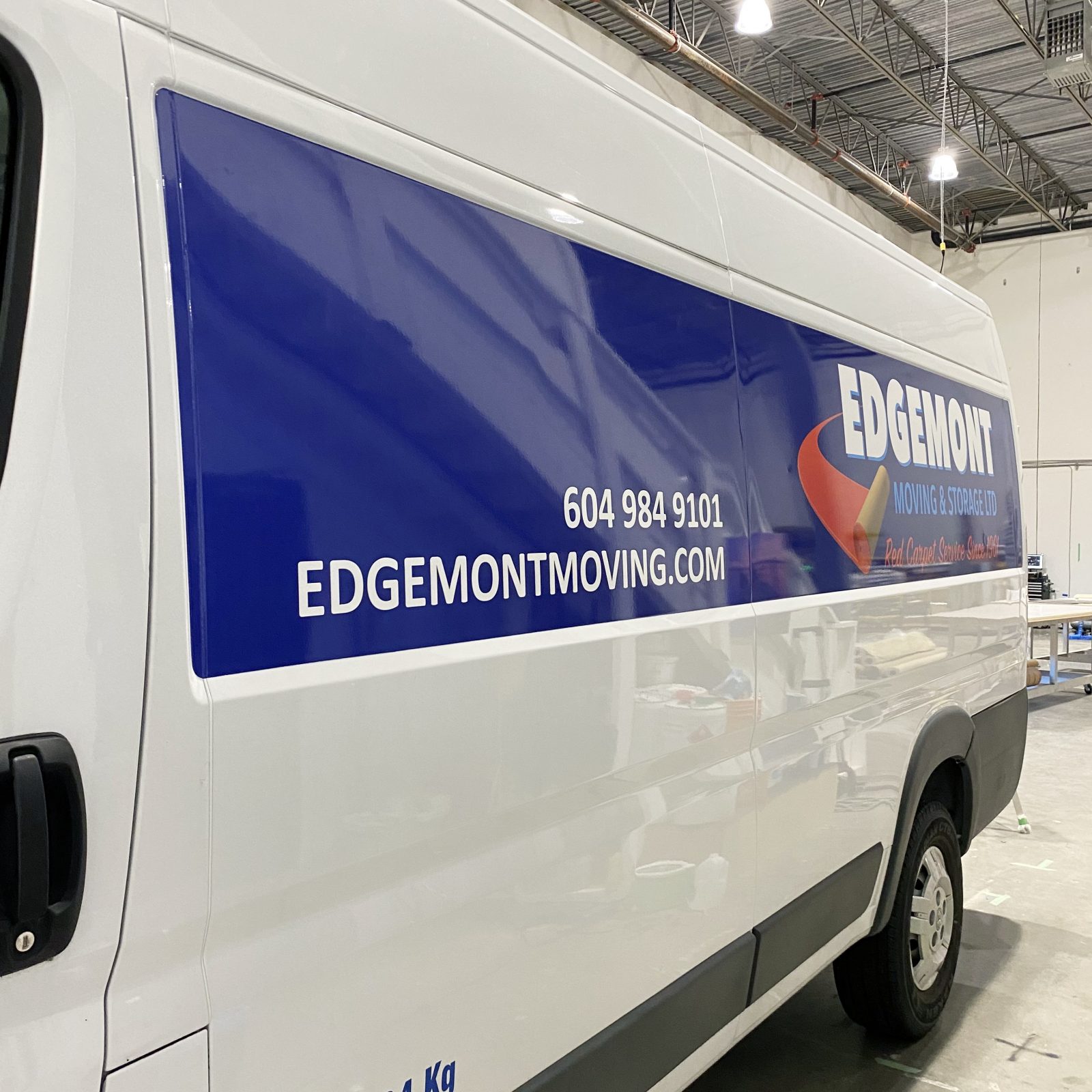 side view of Edgemont Moving Car wraps