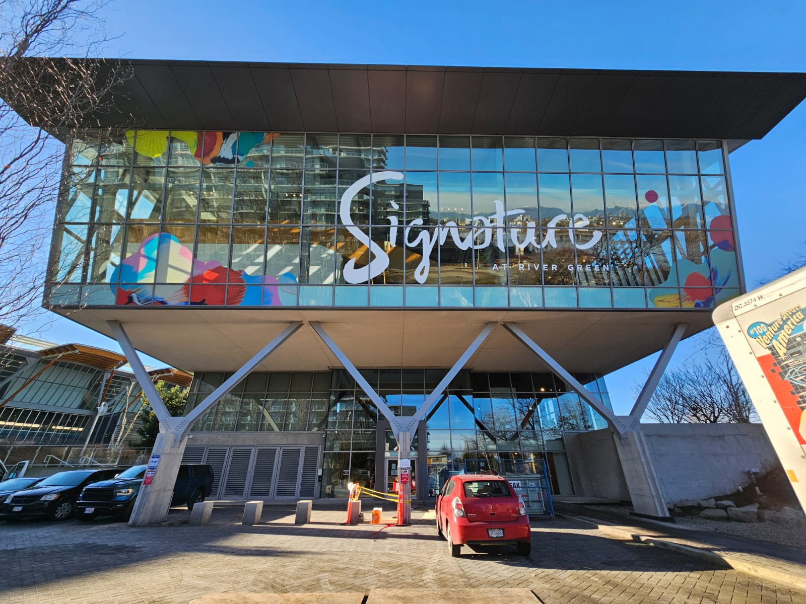 Large exterior window graphics installation at Signature at River Green, Richmond, by Can-Design