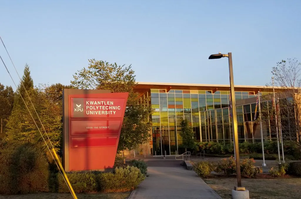 Monument sign for Kwantlen Polytechnic University campus entrance, designed to meet Metro Vancouver signage regulations.
