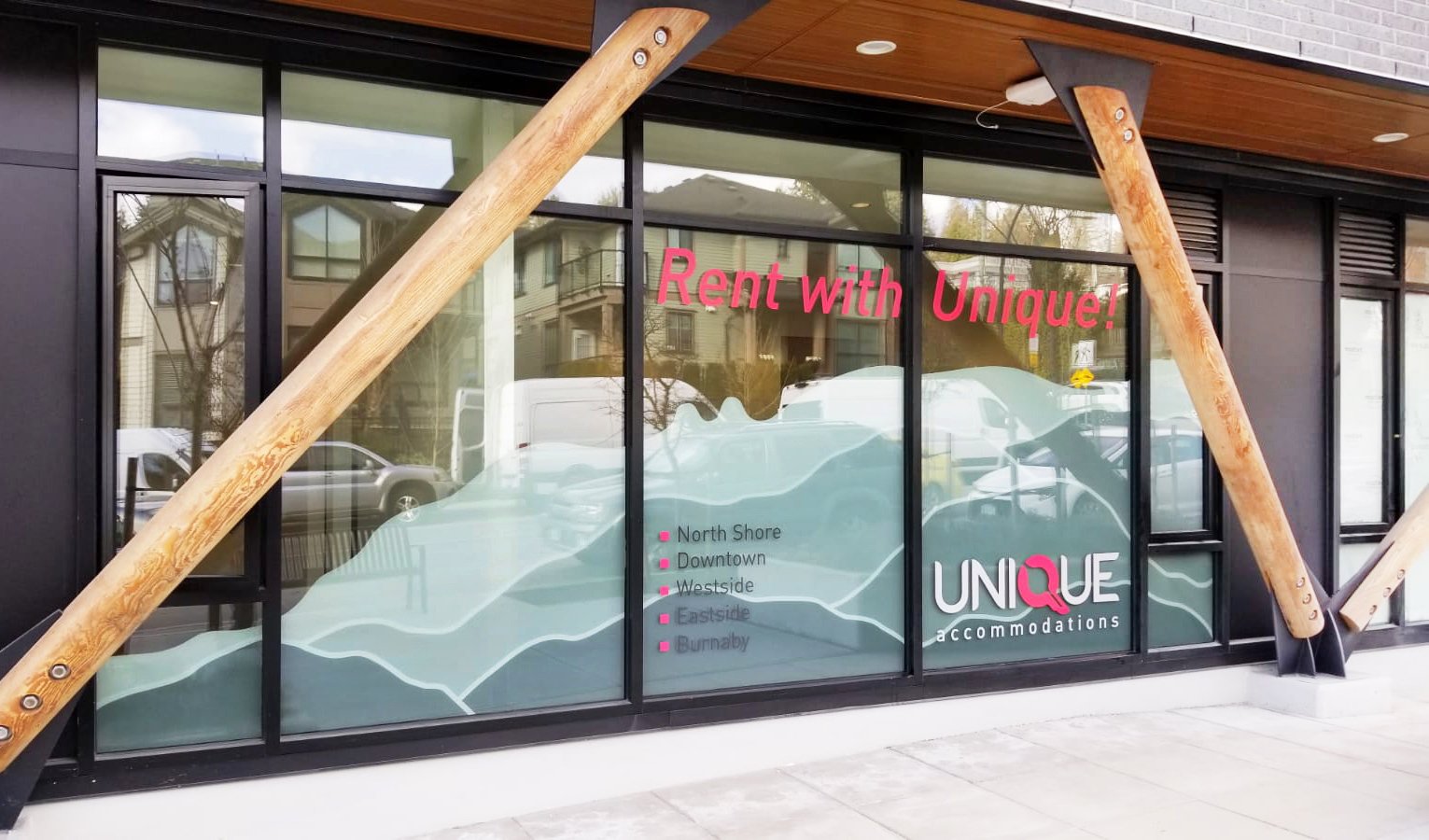 Multi-grey mountainscape window graphic at Unique Accommodations in North Vancouver, letting natural light into the space